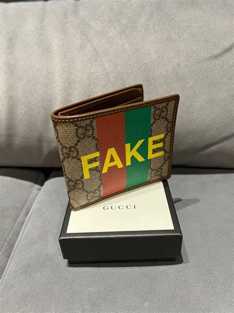 gucci not fake wallet|gucci men's wallet knockoff.